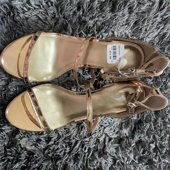 Brand new Fioni bronze heel shoes. - Picture 1 of 3